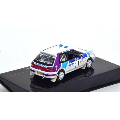 1:43 Масштабная модель MAZDA 323 GTX #11 Mikkola/Hertz 1000 Lakes Rally (с люстрой) 1990